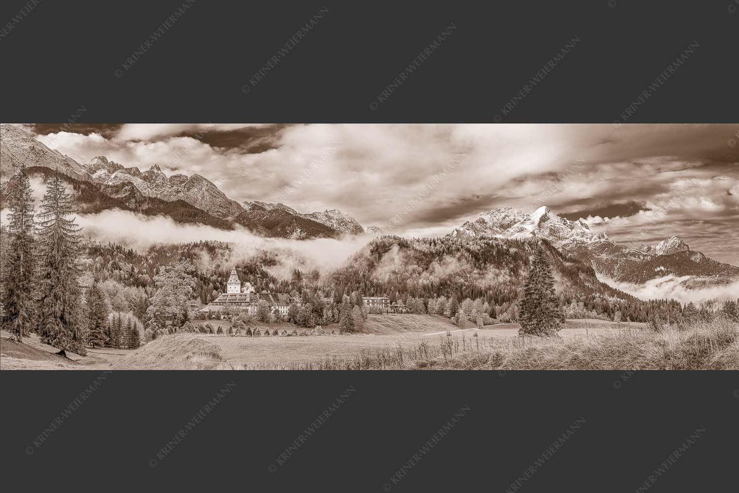 Wie im Märchen liegt das Schloss, umgeben von Wald und unzähligen Gipeln - Elmau 3:1 sepia -- Schloss Elmau im Wetterstein - mehr Infos bei www.Kriner-Weiermann.de