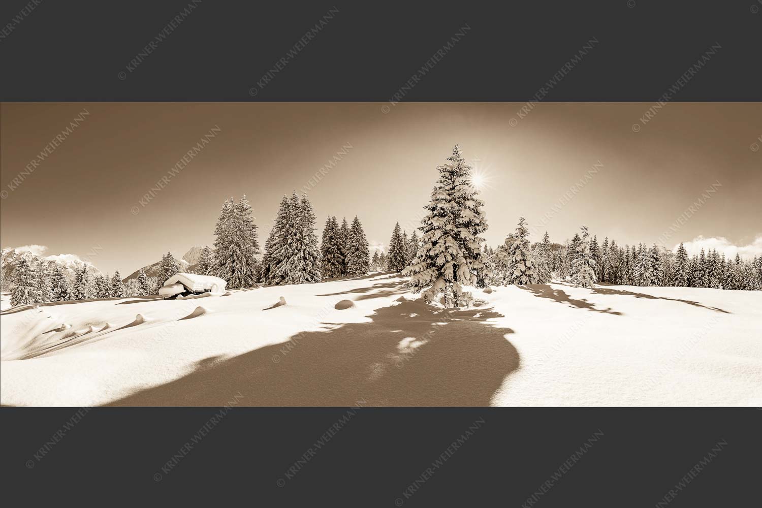 Verschneite Winterlandschaft mit Karwendel im Hintergrund - Reichlich Schnee 2,5:1 sepia -- Winter Wald Karwendel - mehr Infos bei www.Kriner-Weiermann.de